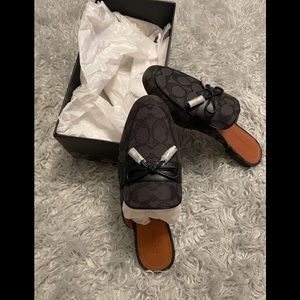 NWT Coach black signature slides.